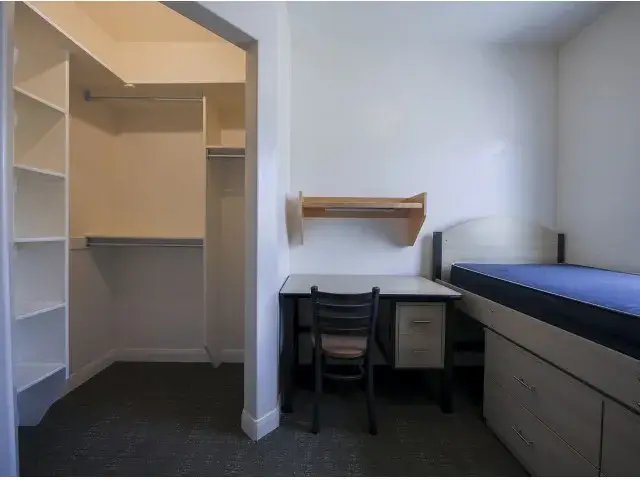 closet and bedroom with bed
