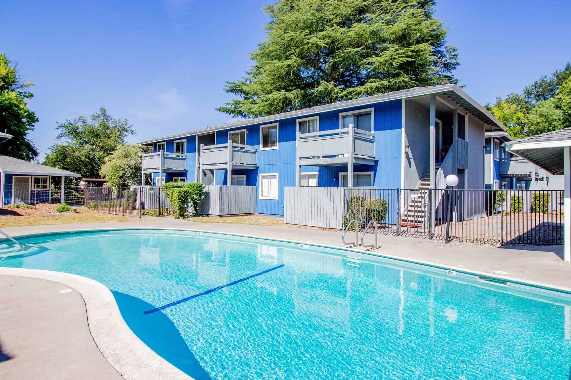 swimming pool next to apartments